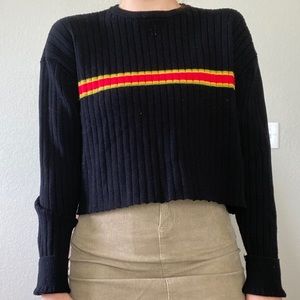 black pullover sweater with red & yellow stripes